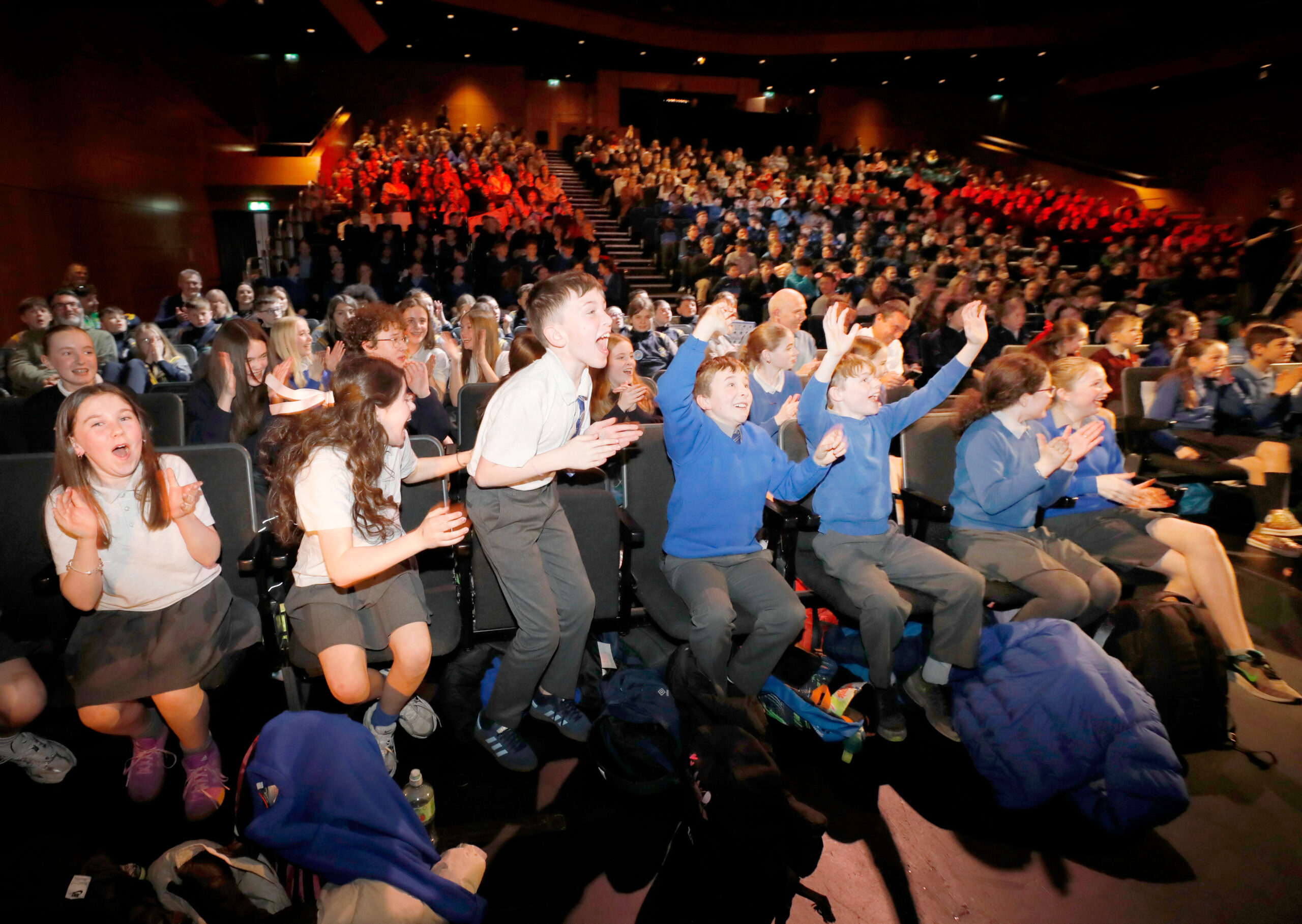 Children cheering in audience for the awards